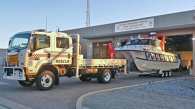 SA State Emergency Service rescue vehicle and boat in front of the Port Lincoln Unit building
